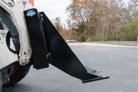 skid steer tree grabber|skid steer tree puller.